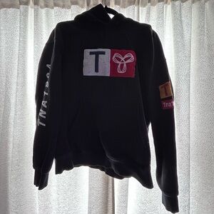 TNA Black Hoodie with Colorful Logo Patches